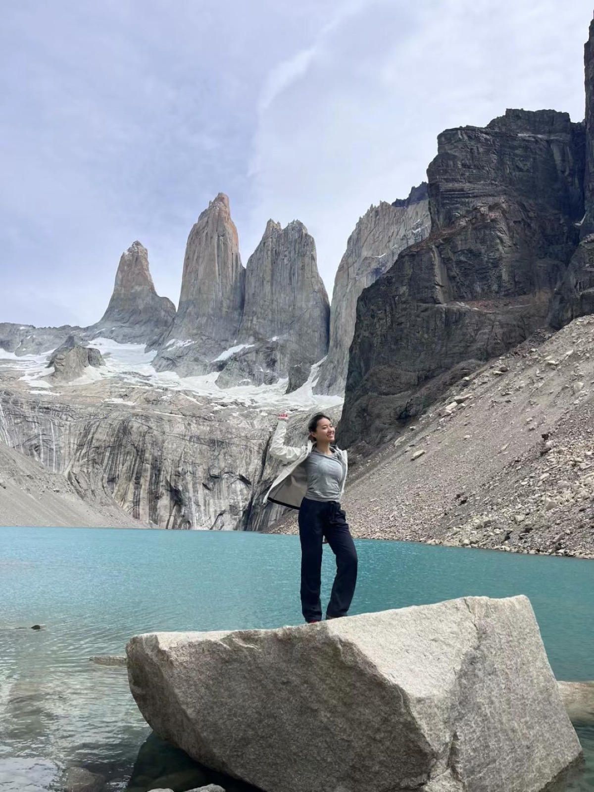 Fuma beside the Torres del Paine towers in Patagonia