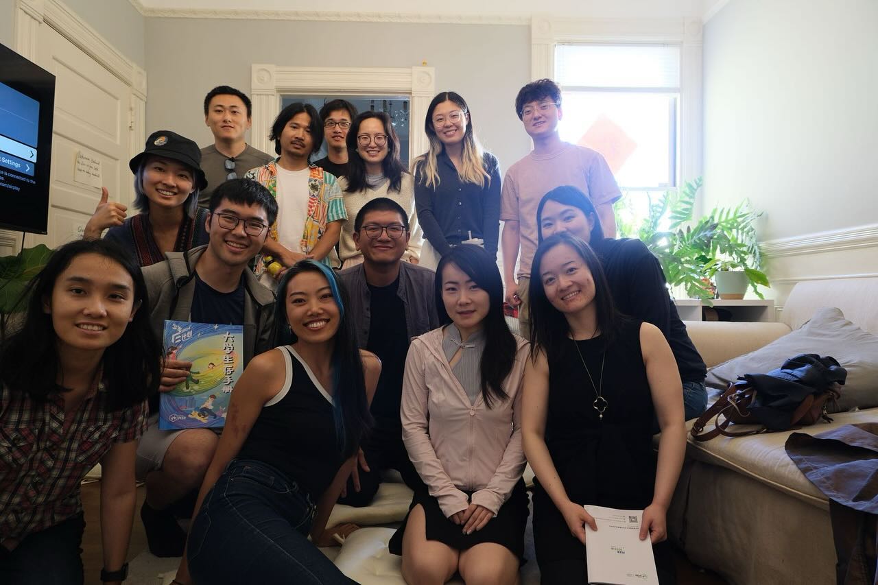 Members of the Thriving Mushrooms coliving community gathered inside a Noe Valley home